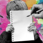 Boy-holding-notepad Boy-holding-notepad