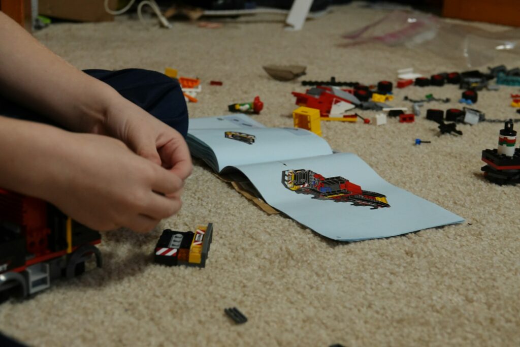 Lego instruction book sean-d-5L9jBBAsfL0-unsplash