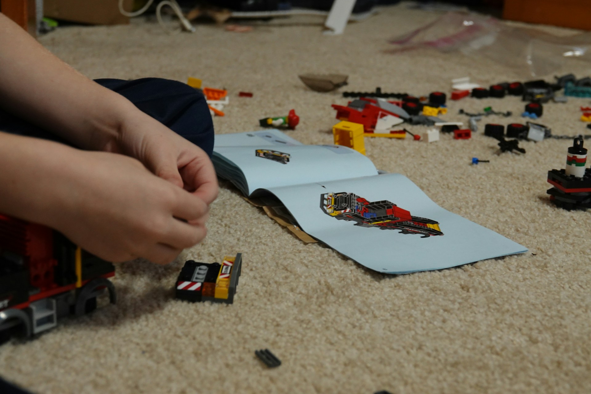 Lego instruction book sean-d-5L9jBBAsfL0-unsplash